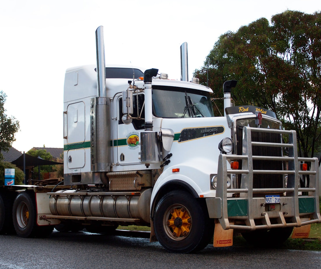 Raptor Towing and Transport truck on the open road