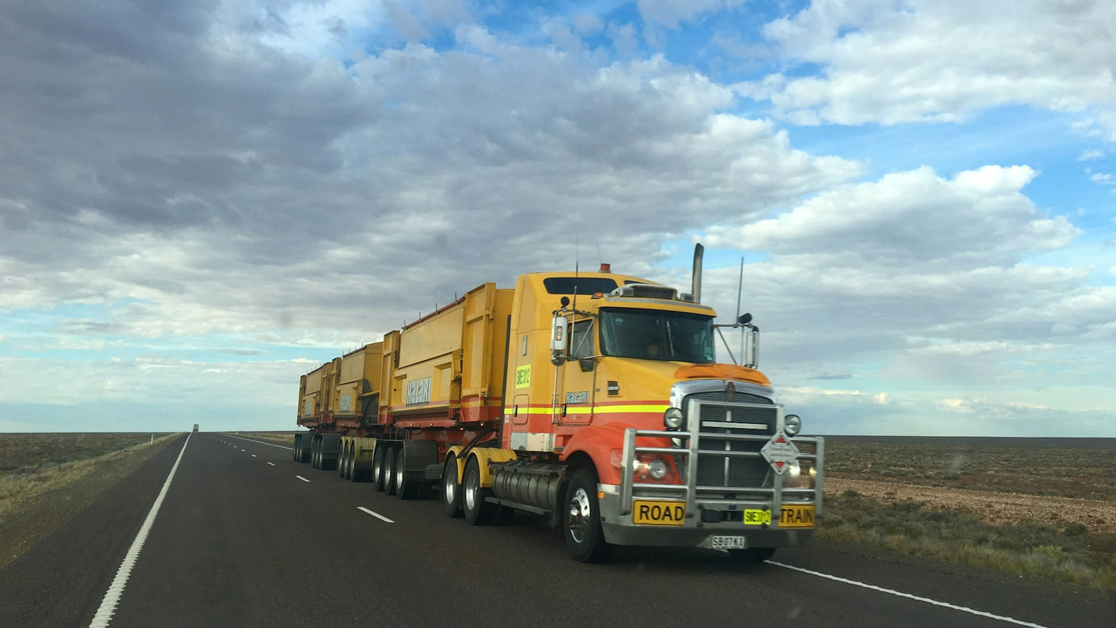 Raptor Towing and Transport trucks on a country road in the Barossa Valley